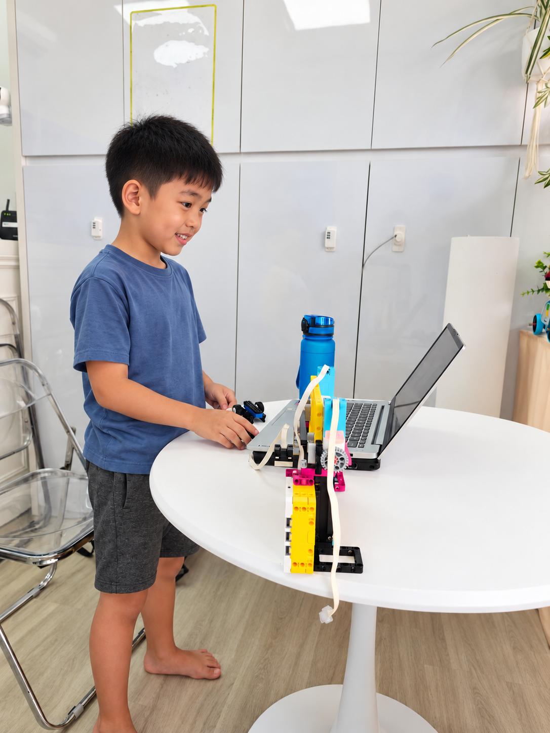 AI-edited illustration of a child working at a laptop beside a robotics project