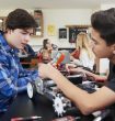two-male-pupils-building-robotic-vehicle-in-science-lesson.jpg